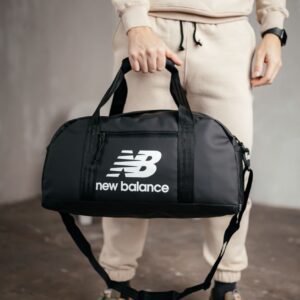 Дорожня сумка біла екошкіра New Balance з ременем