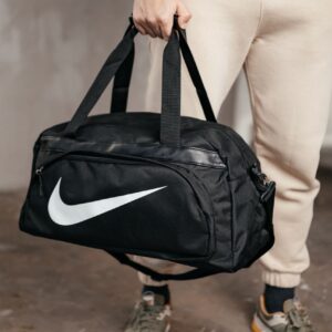 Дорожня сумка біла Nike з тканини Оксфорд з принтом
